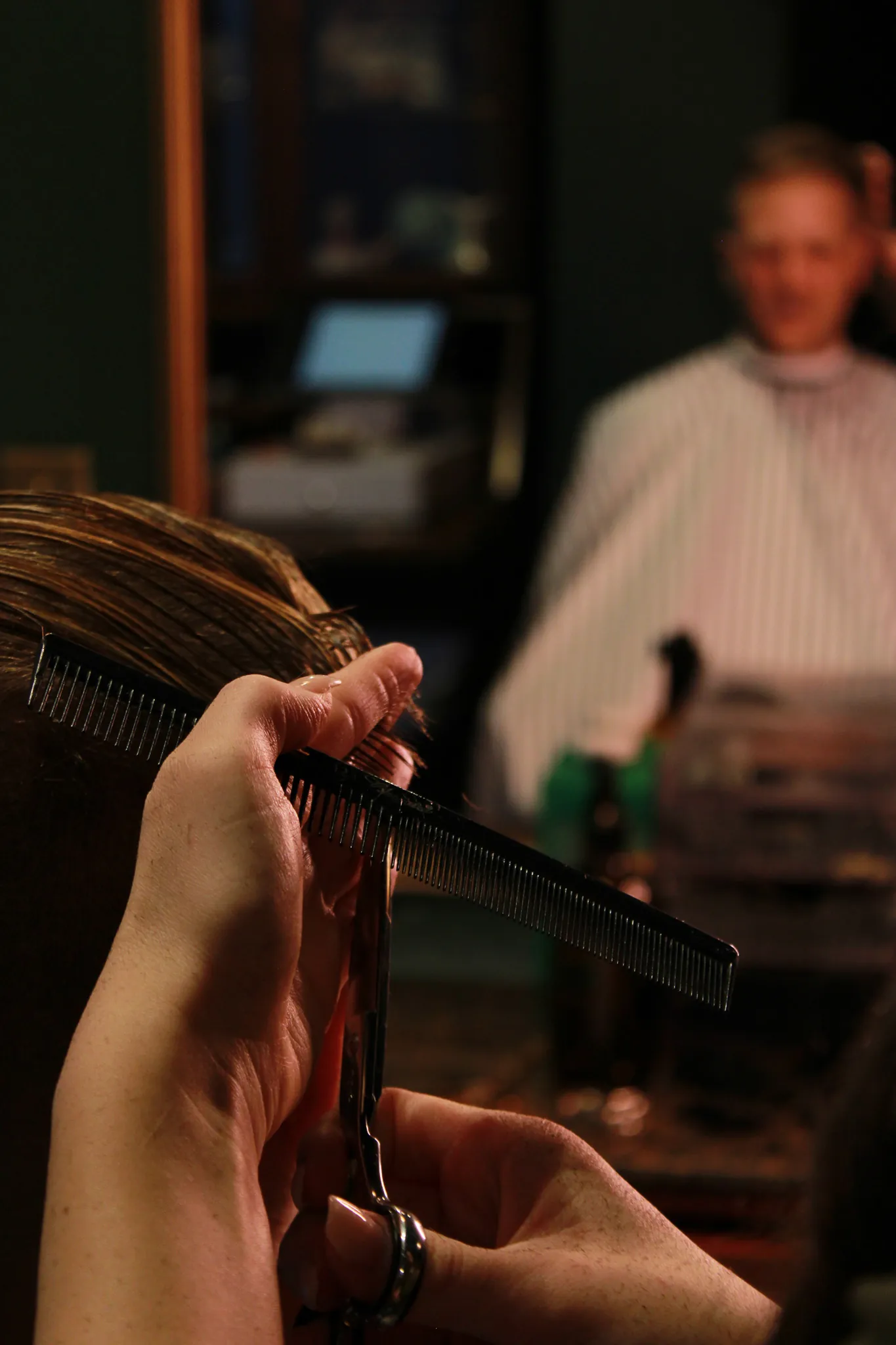 Details at Vintage Blade Barbershop — brass, mahogany and blades